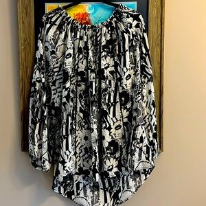 Lightweight top slightly sheer.